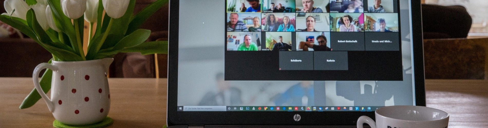 Photo of a computer screen with a virtual meeting.